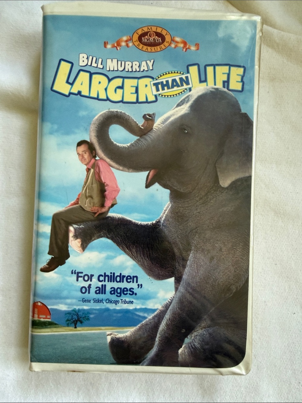 4/ $10 ~ Larger Than Life (Blue) VHS - Bill Murray